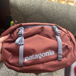 Patagonia Brick Red Sling Bag with Gray Straps